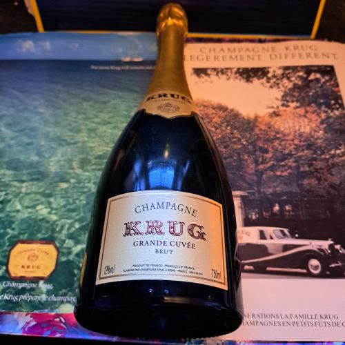 KRUG GRAND CUVEE WITH AT LEAST 8 YEARS BOTTLE AGE. - Auction